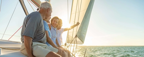 Families sailing on a sunny day.