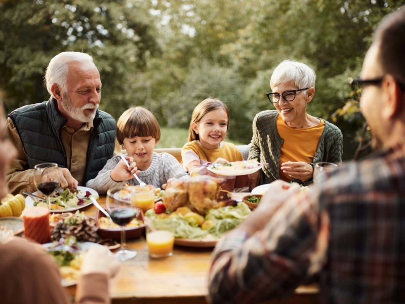 Family eating dinner together.