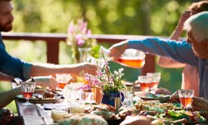 financial review concept of family at dining table outdoor summer
