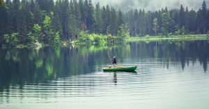 retirement-fishing-on-lake-with-canoe